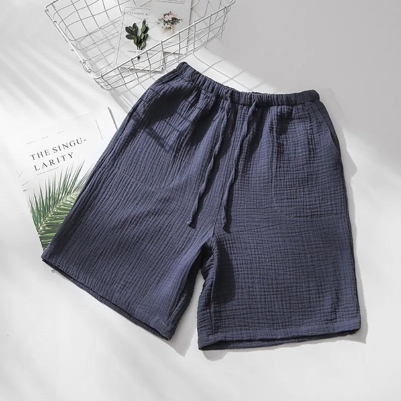Short de pyjama jaune moutarde en gaze de coton, design unisexe fluide idéal pour les nuits d'été.