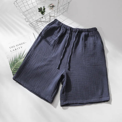 Short de pyjama jaune moutarde en gaze de coton, design unisexe fluide idéal pour les nuits d'été.