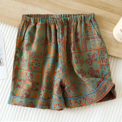 Short de nuit orange aux motifs ethniques vintage, taille élastiquée et finitions soignées.