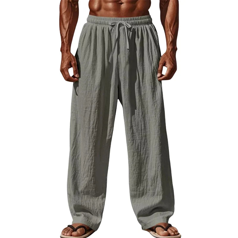 Pantalon fluide noir pour homme, textile léger et respirant, parfait pour un style décontracté.