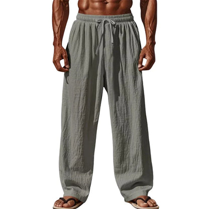Pantalon fluide noir pour homme, textile léger et respirant, parfait pour un style décontracté.