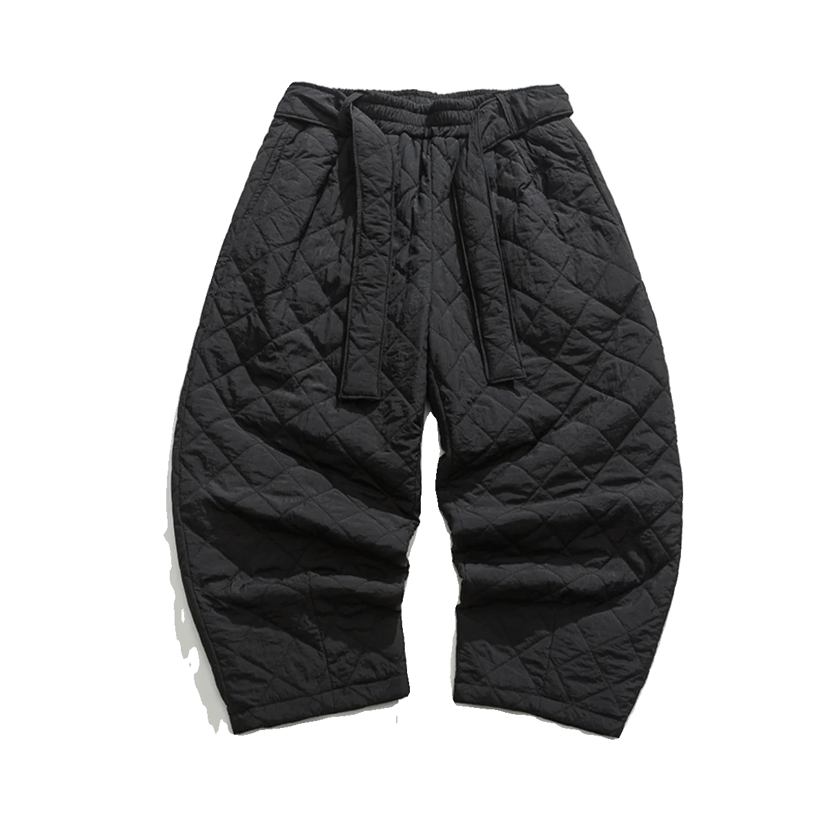 Pantalon sarouel matelassé noir pour homme, coupe ample et confortable avec surpiqûres.