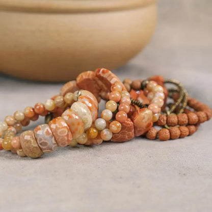 Bracelet Double Rang Pierre Corail et Laiton – Bijou Oriental de Prospérité