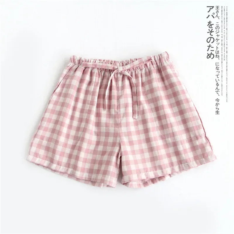 Short de pyjama court en coton léger, idéal pour une tenue d'intérieur décontractée et fraîche.