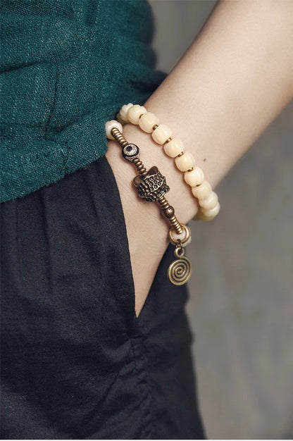 Bracelet Double Rang Os de Yak Tibétain et Cuivre Martelé – Paix et Énergie Positive