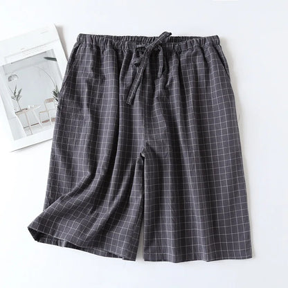 Short de pyjama homme en coloris bleu ciel à carreaux, idéal pour un confort nocturne optimal.