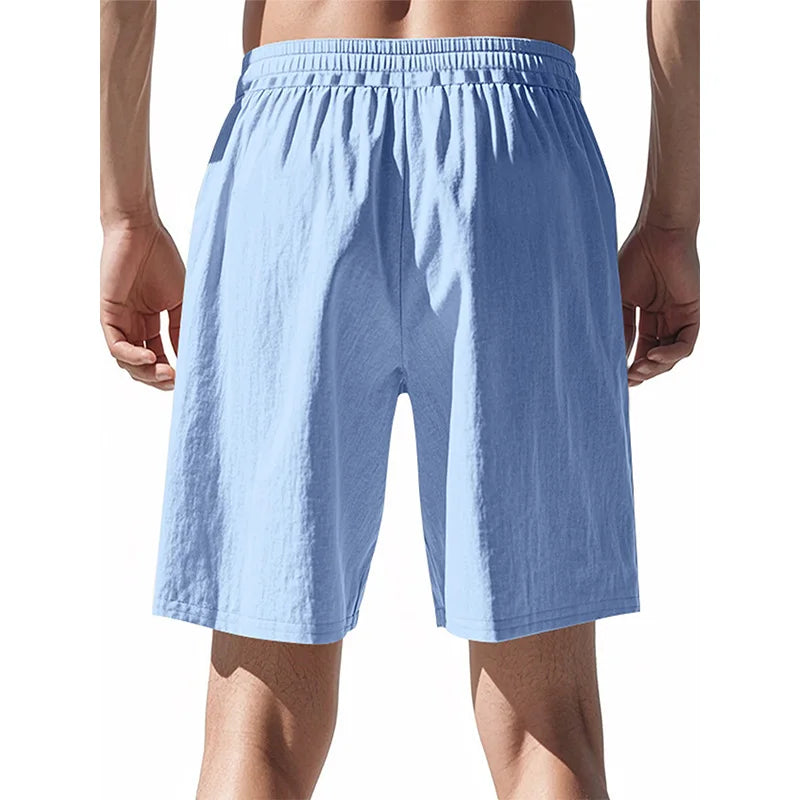 Vue arrière du short de détente bleu clair, montrant la taille élastique froncée.