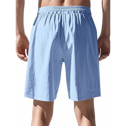 Vue arrière du short de détente bleu clair, montrant la taille élastique froncée.