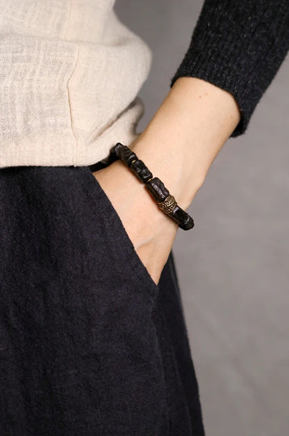 Bracelet Ébène Sculptée Rétro et Breloque Vajra en Laiton – Bois Noir Véritable