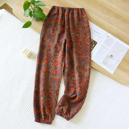 Pantalon de nuit jaune à motifs traditionnels, coupe large confortable en coton doux, vue de face.