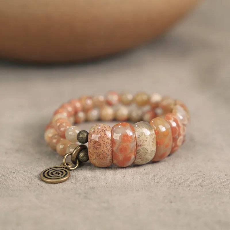 Bracelet Double Rang Pierre Corail et Laiton – Bijou Oriental de Prospérité