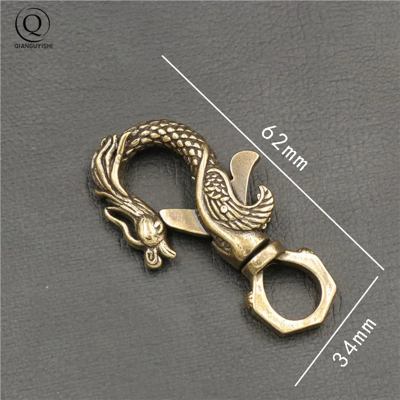 Porte-clés artisanal tête de renard en cuivre, dimensions 51 mm par 18 mm, style vintage et élégant.