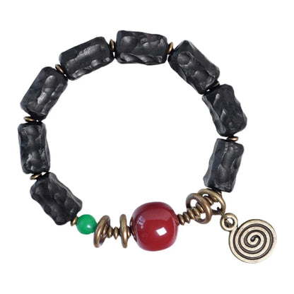 Bracelet Ébène Sculptée et Agate de Gobi – Breloque en Cuivre, Bijou de Couple