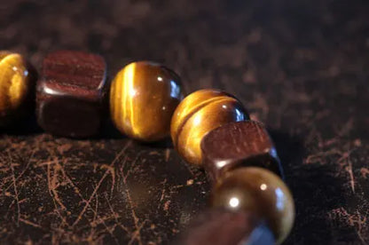 Bracelet Oeil de Tigre 10 mm et Bois d'Ébène – Amulette de Prospérité Homme et Femme