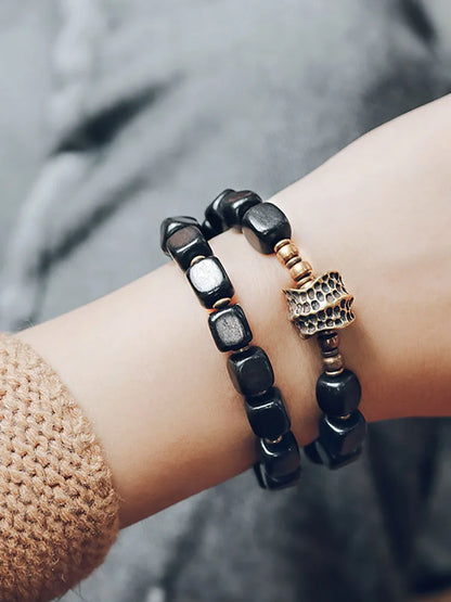 Bracelet Double Rang Ébène et Breloque en Cuivre Martelé Vieilli – Classique Homme et Femme