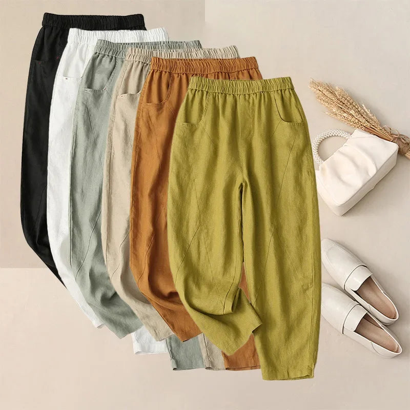 Éventail de pantalons harem femme en lin et coton déclinés en noir, blanc, vert sauge, beige, rouille et jaune.