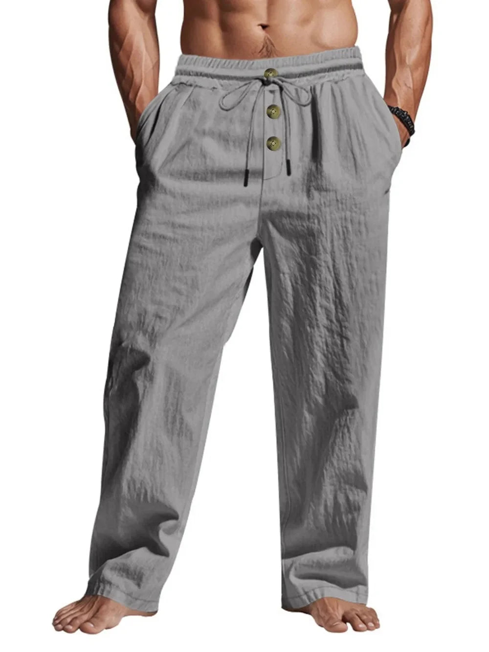 Pantalon décontracté gris foncé pour homme, style urbain léger avec poches latérales pratiques.