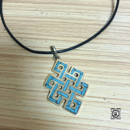 ’Lien Éternel’ - Pendentif Nœud Infini Tibétain En Turquoise Et Laiton Pendentif - Tibet